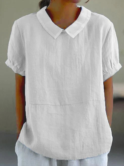 Chic short sleeve blouse for women's fashion. Elegant and comfortable, perfect for modern everyday or office style.