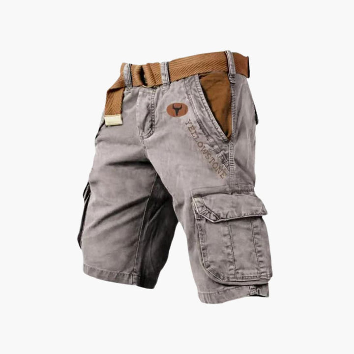 Detailed view of men's cargo shorts, highlighting multiple utility pockets & durable fabric for daily wear.