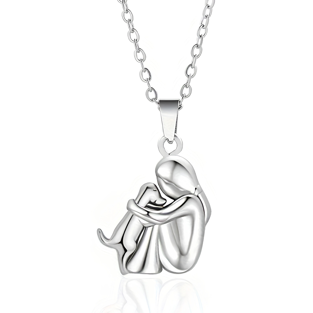 Dog lover's dream gift: women's pet love pendant necklace with a girl & dog embrace charm.