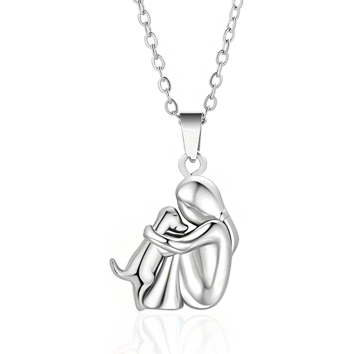 Dog lover's dream gift: women's pet love pendant necklace with a girl & dog embrace charm.