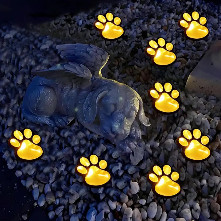 Charming whimsical paw print solar path lights, waterproof LED for delightful garden landscape decor.