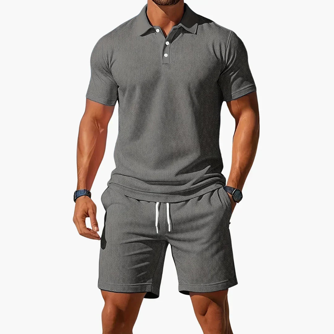 Modern men's summer smart casual set: a well-fitted polo and stylish shorts. Effortless coordinated fashion.