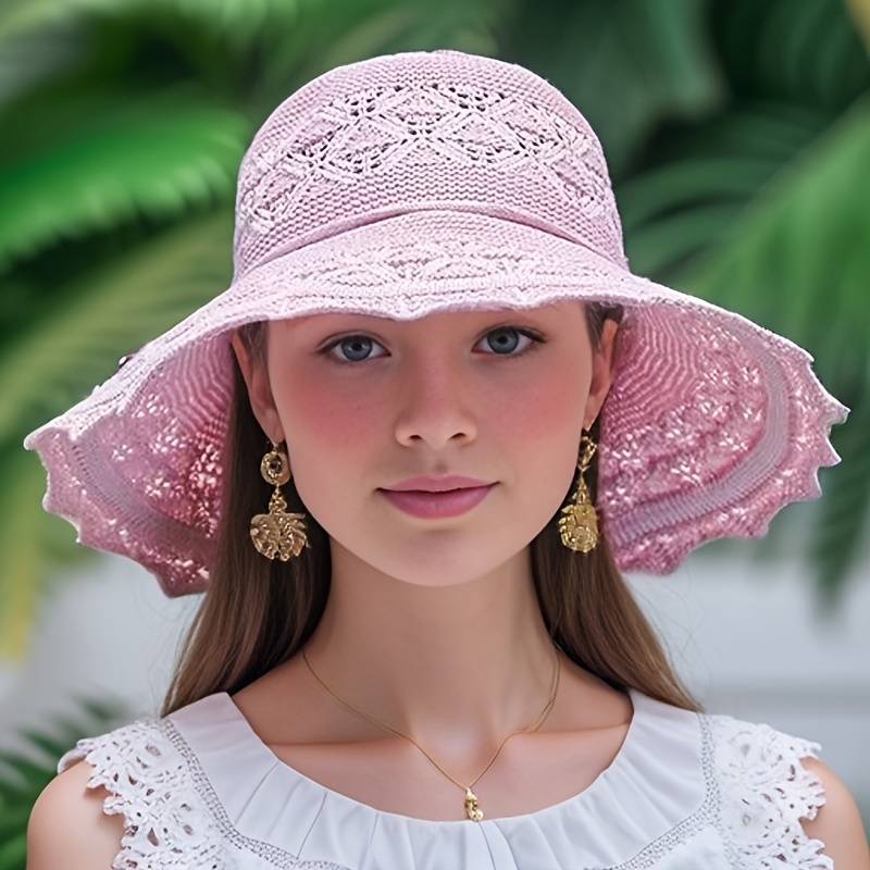 Packable women's travel hat with wide brim. Essential for summer vacations, providing stylish sun & UV protection.