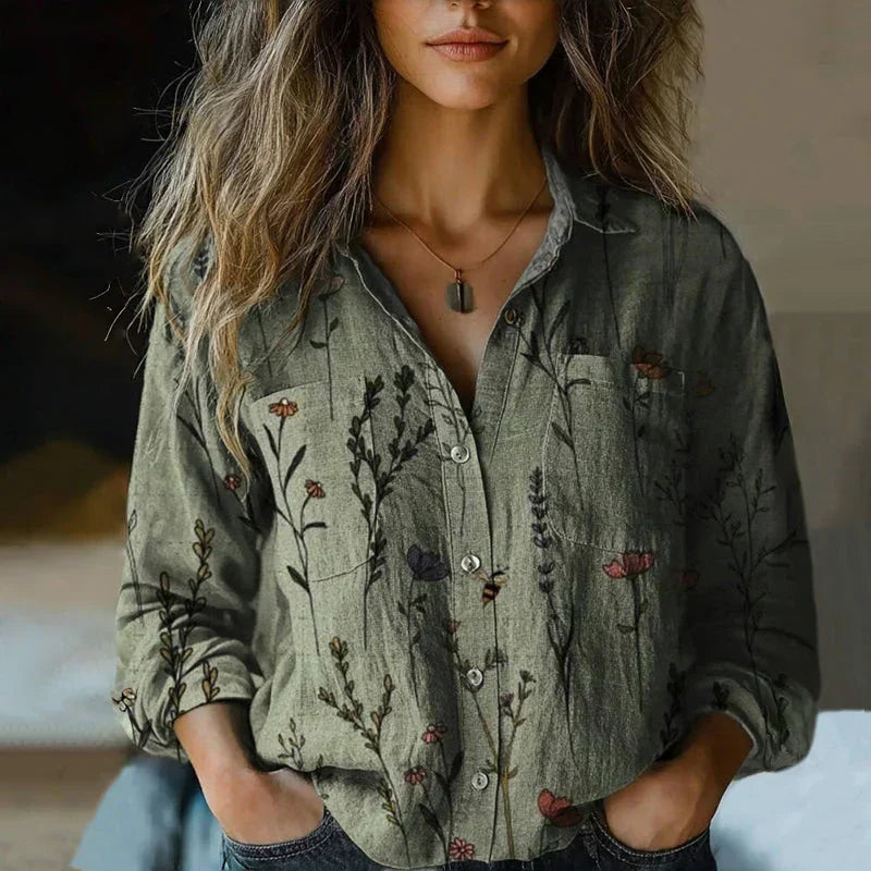 Casual women's long-sleeve blouse featuring a vibrant bohemian vintage floral print. Perfect everyday style collared top.