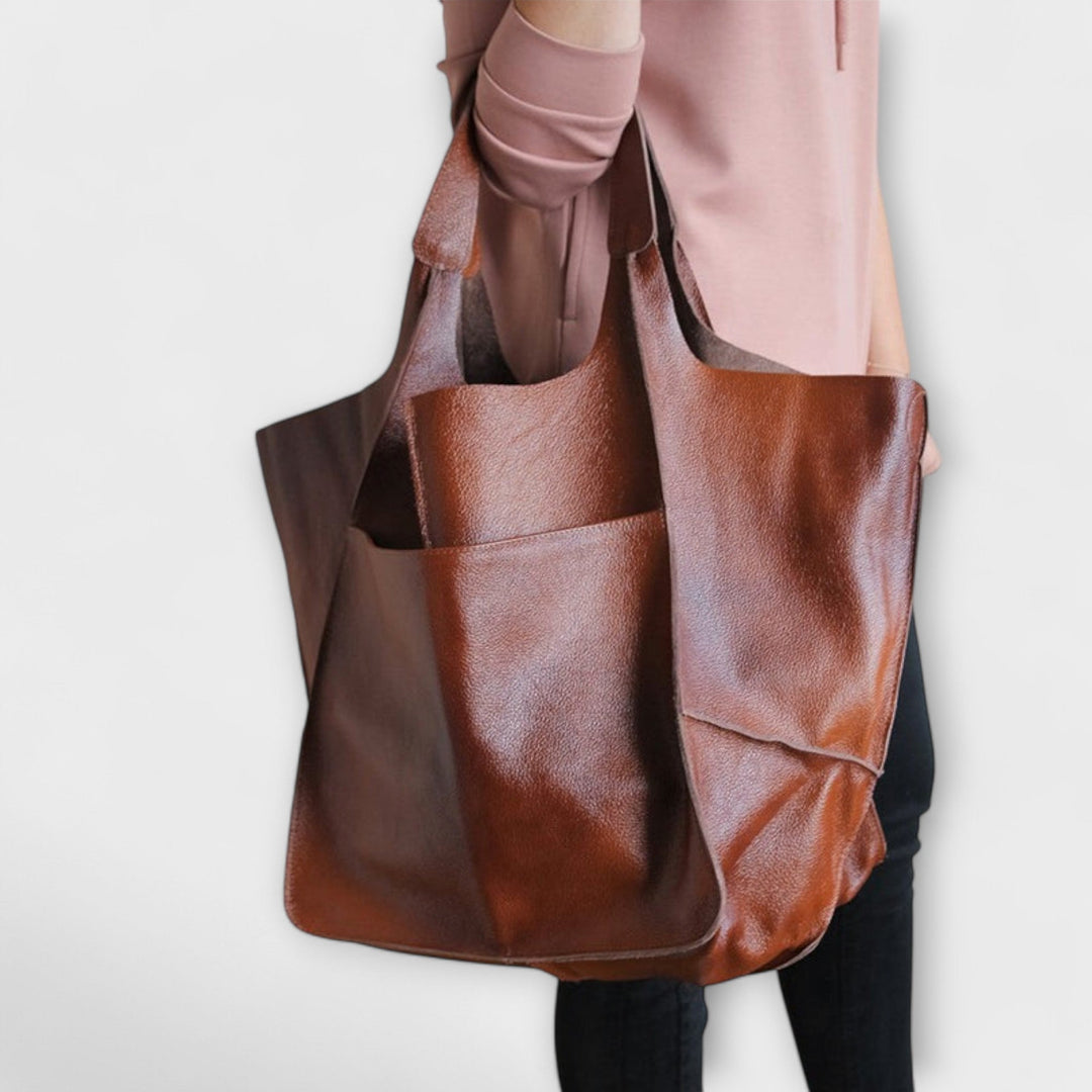 Designer quality women's leather shoulder bag, an oversized weekender for stylish travelers.
