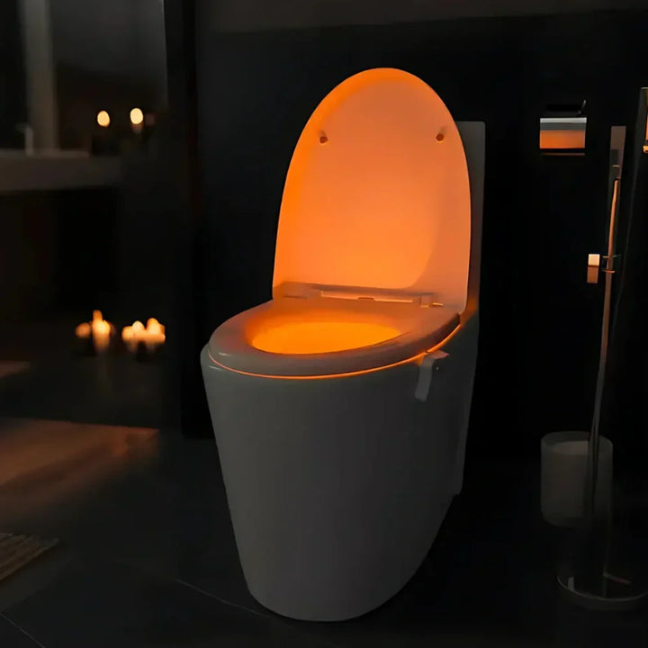 Stylish color-changing LED toilet night light, motion activated for modern bathroom decor. Easy to install & use.