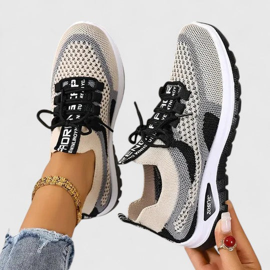 Breathable women's comfort footwear, lightweight active shoes providing cushioned support for walking.