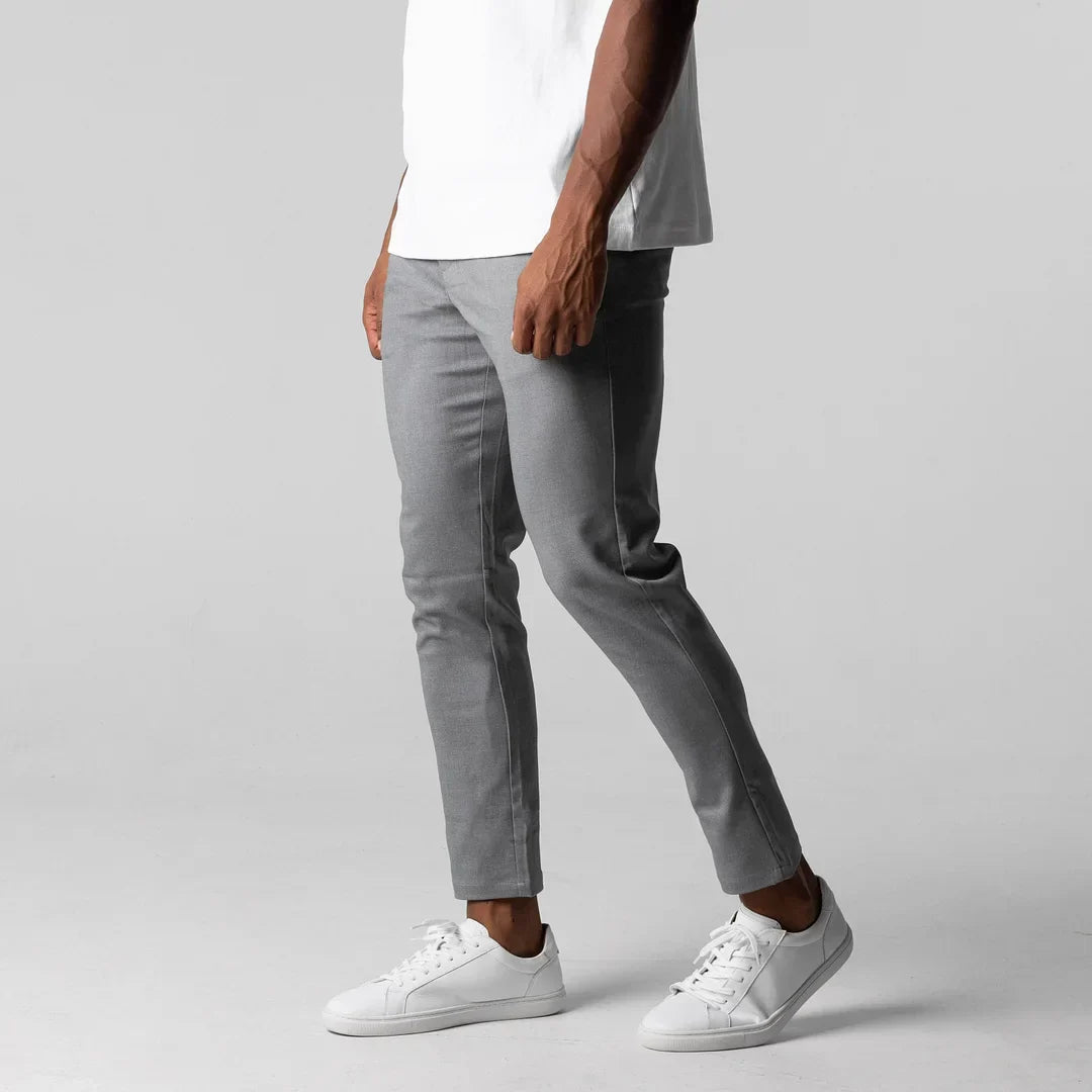 Stylish black men's active chino pants, combining comfort & everyday versatility.