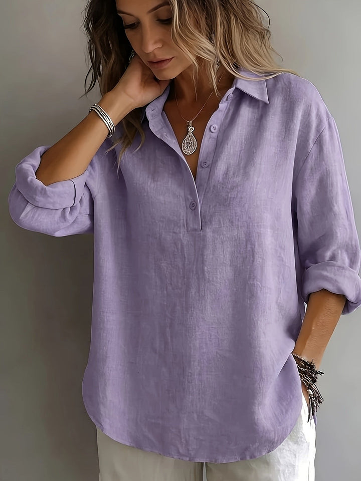 Spring fashion women's collared blouse. Relaxed fit, long sleeve for elegant summer style.