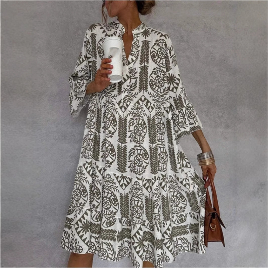 Relaxed fit women's tunic midi dress, vibrant floral print. Comfortable & stylish casual wear for spring & summer.