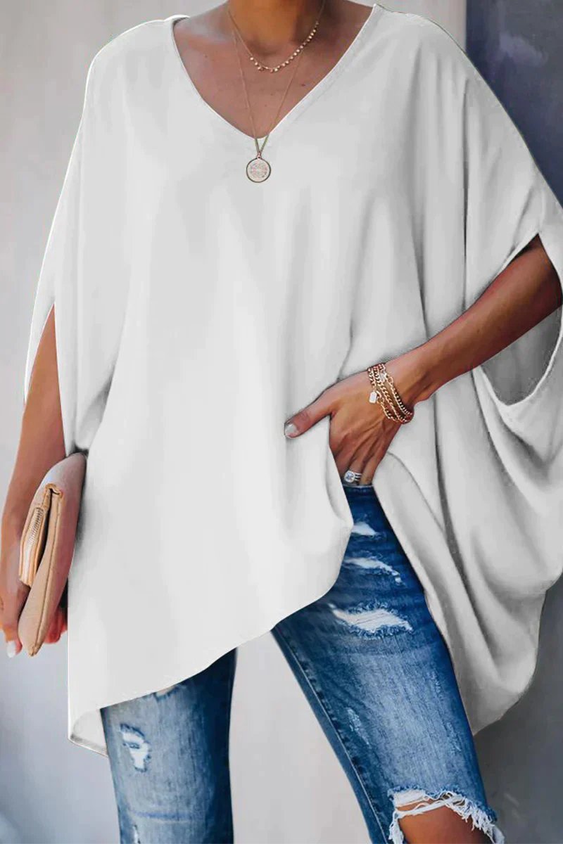 Rainbow women's oversized V-neck tunic with batwing sleeves, offering a relaxed and comfortable everyday fit.