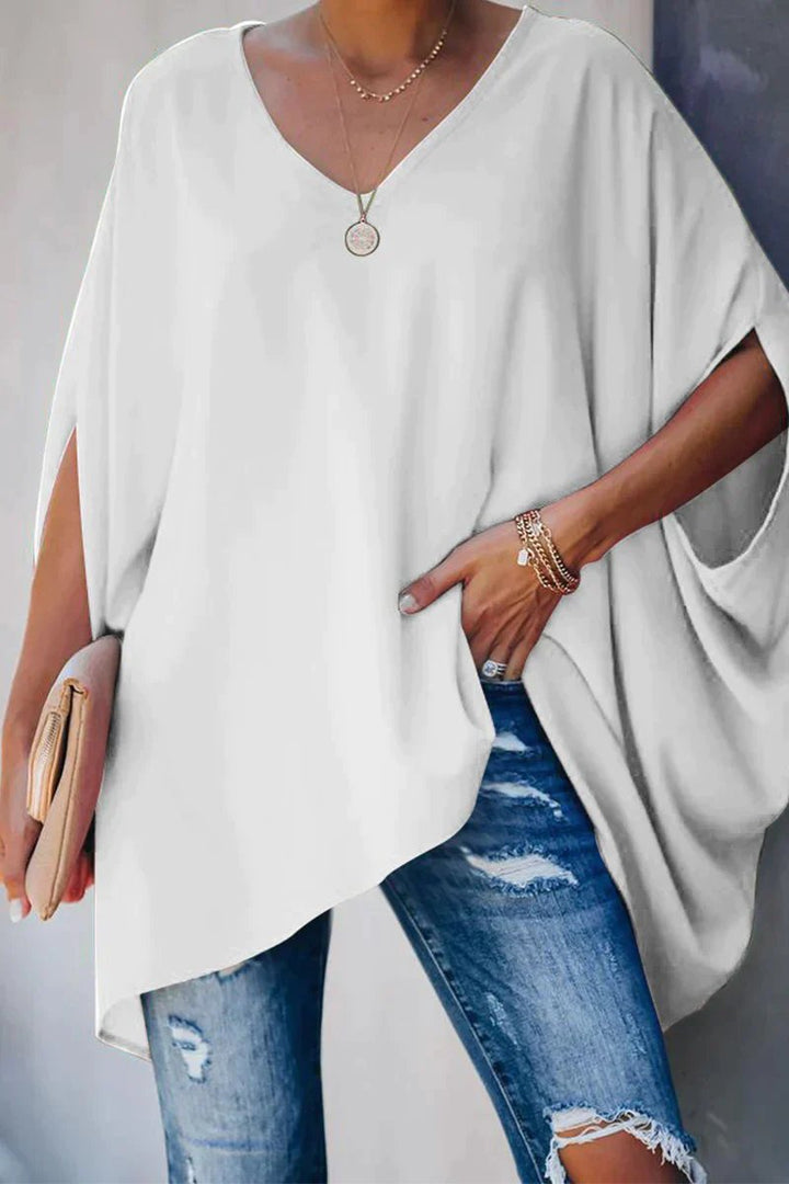 Rainbow women's oversized V-neck tunic with batwing sleeves, offering a relaxed and comfortable everyday fit.