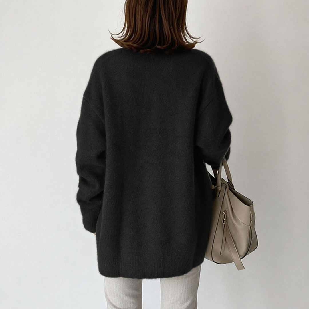 Versatile women's mid-length button cardigan for easy, elegant everyday outfits.