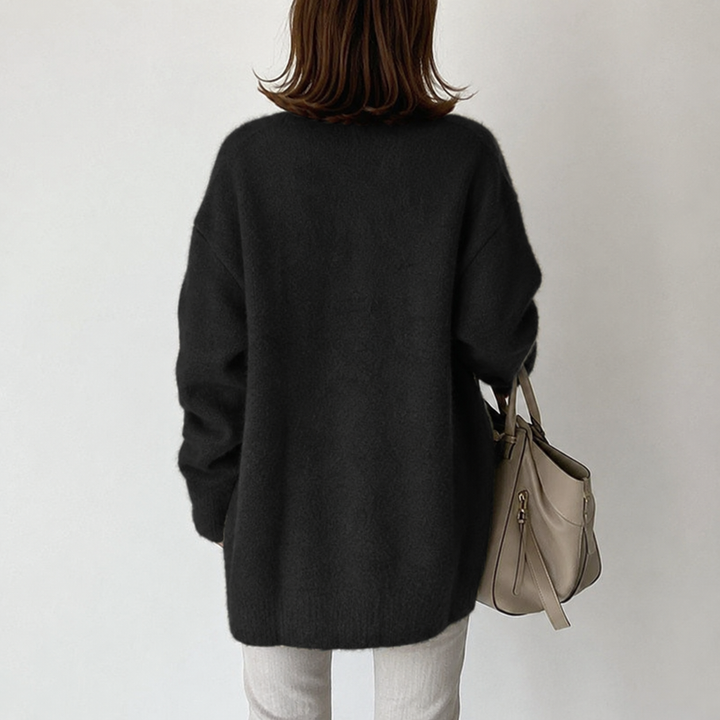 Versatile women's mid-length button cardigan for easy, elegant everyday outfits.