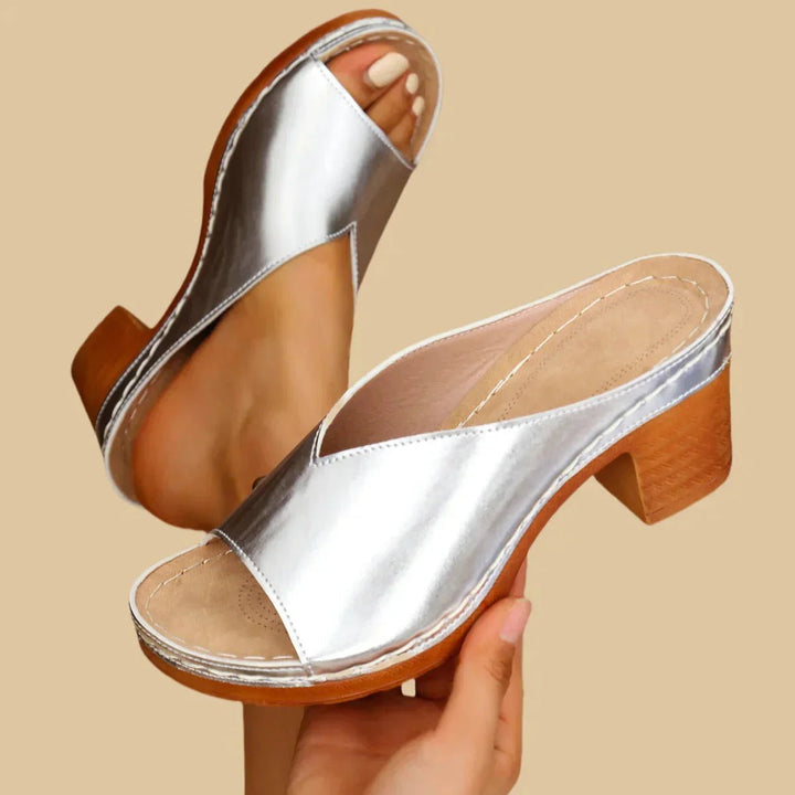Elegant women's slip-on sandals, block heel design, providing orthopedic comfort & support for casual wear.