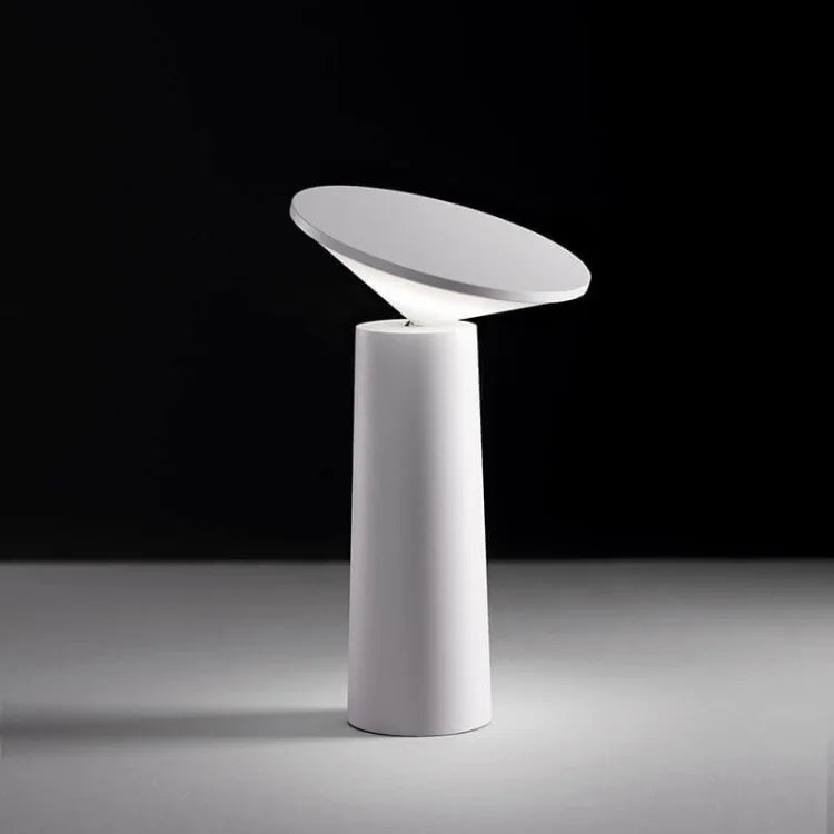 Portable dimmable LED table lamp with flexible arm, wireless for any space.