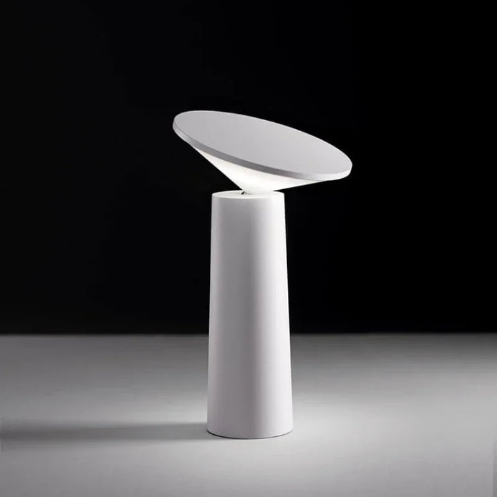 Portable dimmable LED table lamp with flexible arm, wireless for any space.