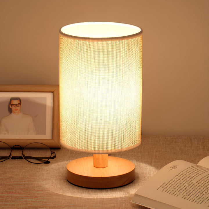 Adjustable light wood table lamp for bedside. Organic style, dimmable LED. Nvroome home lighting solution.