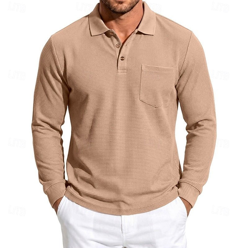 Detail shot of a men's textured long-sleeve polo shirt. Showcases fabric for refined casual & smart style.