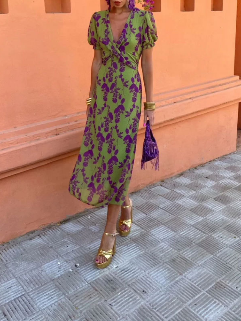 Women's green floral V-neck midi dress with short sleeves. Perfect for summer elegance & casual spring wear.