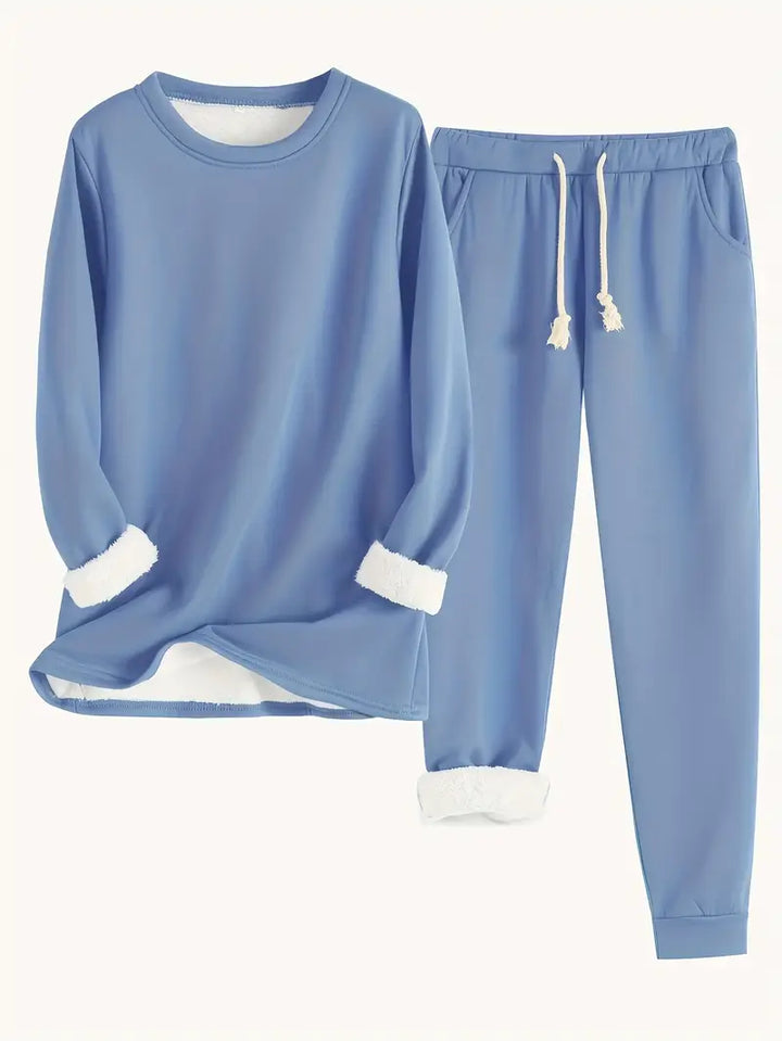 Women's cozy two-piece lounge set in soft fabric for ultimate comfort & relaxed casual wear.