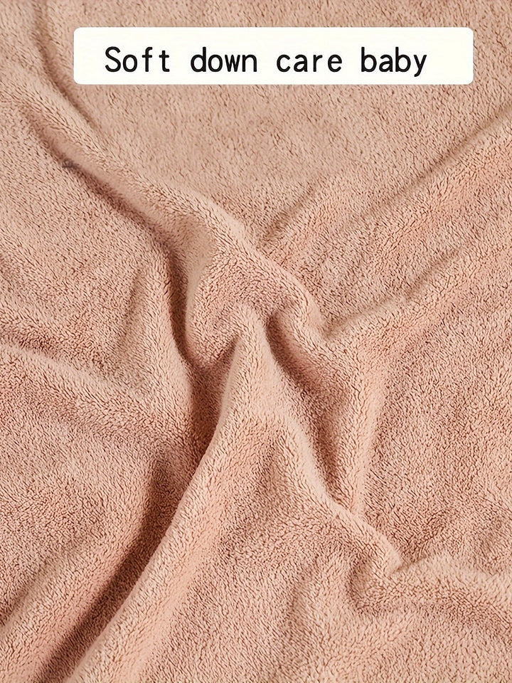 Light green hooded towel for kids. Ultra-soft, absorbent, and fast-drying for pool essential comfort.