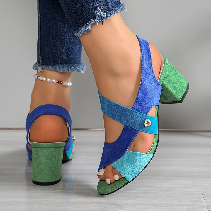 Elegant women's open-toe block heels, offering chic style & supportive comfort for any occasion.