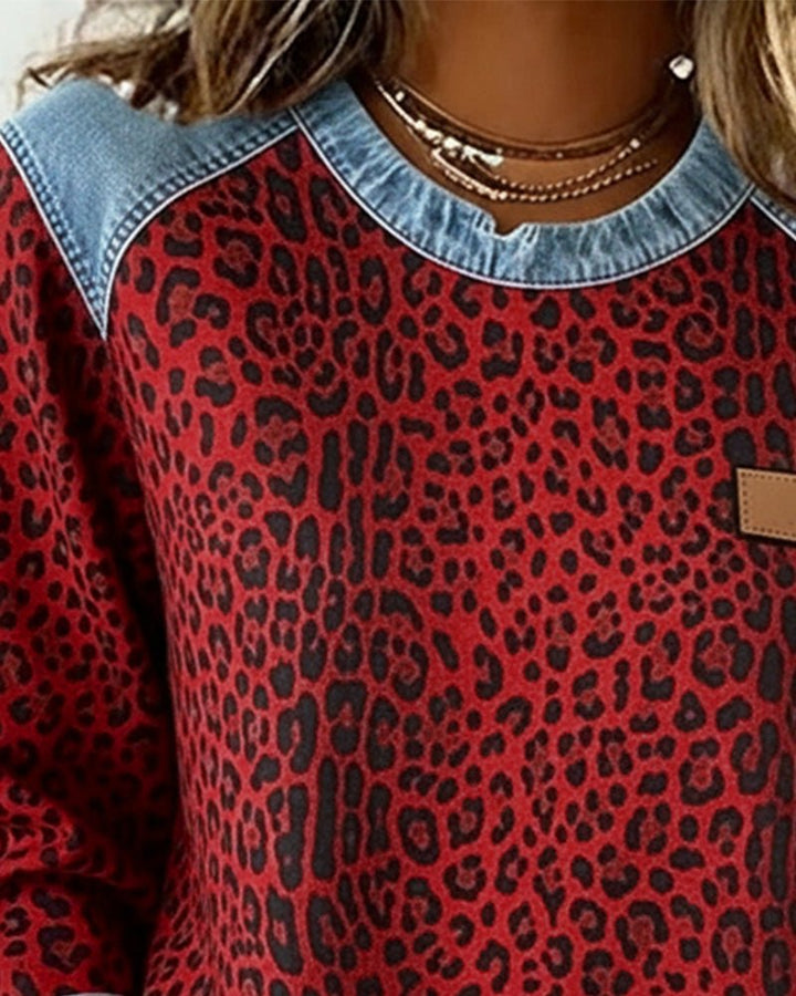 Women's chic leopard print knit pullover sweater, trendy and comfortable for casual fall and winter fashion.