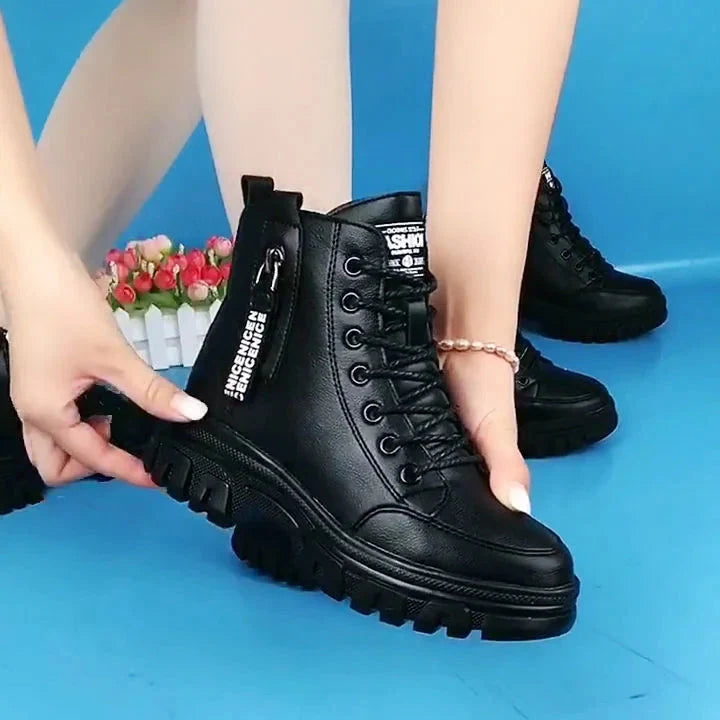 Versatile women's high-top combat boots; sturdy leather, practical side zipper, and adjustable lace-up closure.
