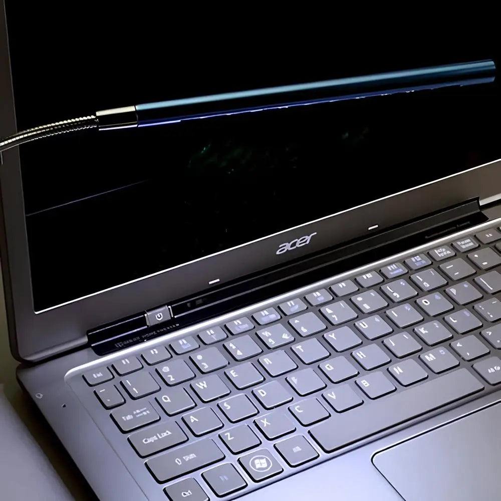 Gooseneck USB LED light for keyboards, dimmable and portable, ideal for computer use.