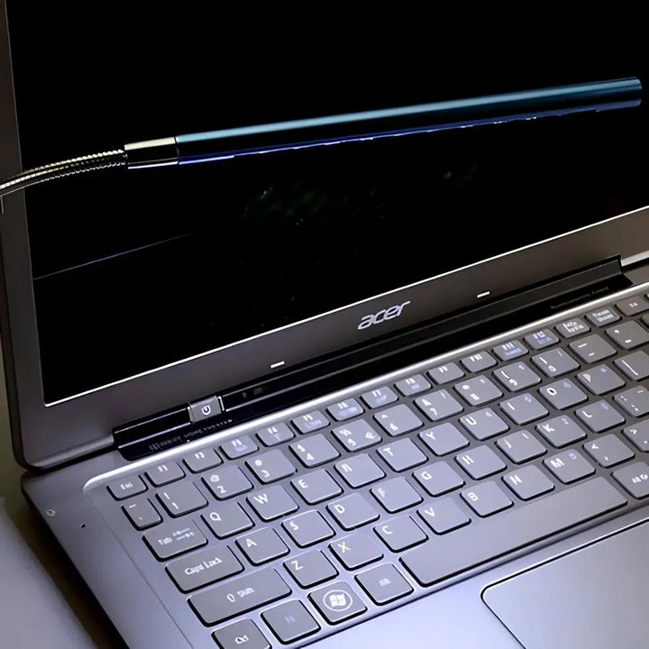 Gooseneck USB LED light for keyboards, dimmable and portable, ideal for computer use.