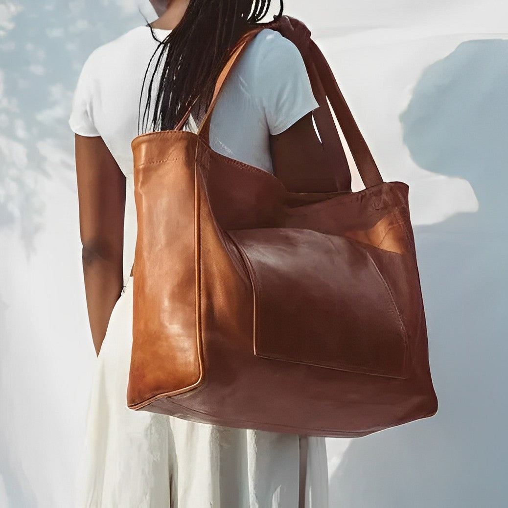 Elegant black vintage leather handbag. Durable women's shoulder bag & crossbody for versatile everyday use.