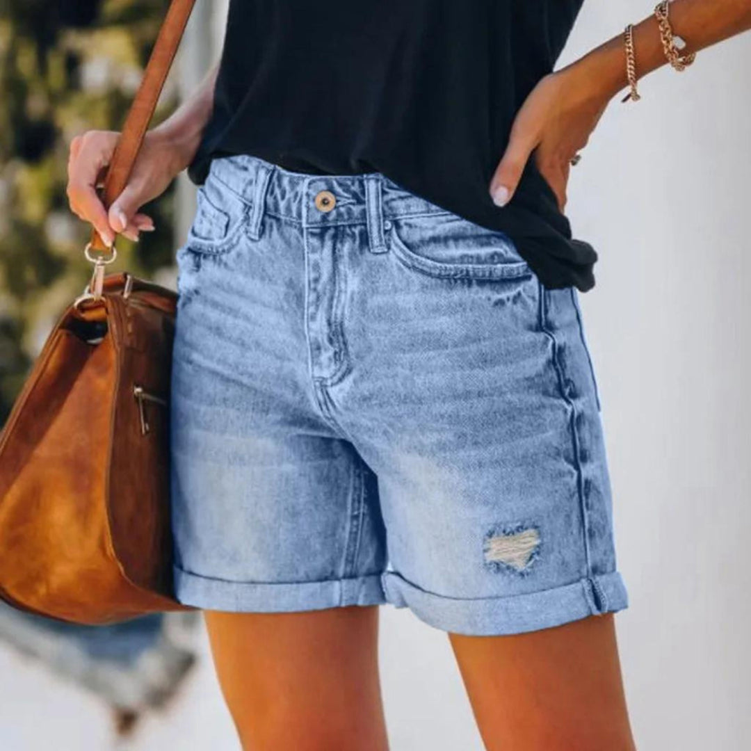 Blue high-waisted women's shorts, perfect for summer vacation outfits & everyday casual chic style. Comfortable fit.