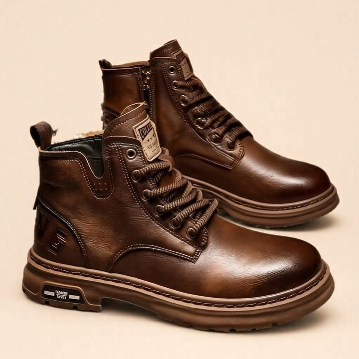 Adventure-ready men's leather boots with durable traction grip, lace-up design for outdoor comfort & rugged style.