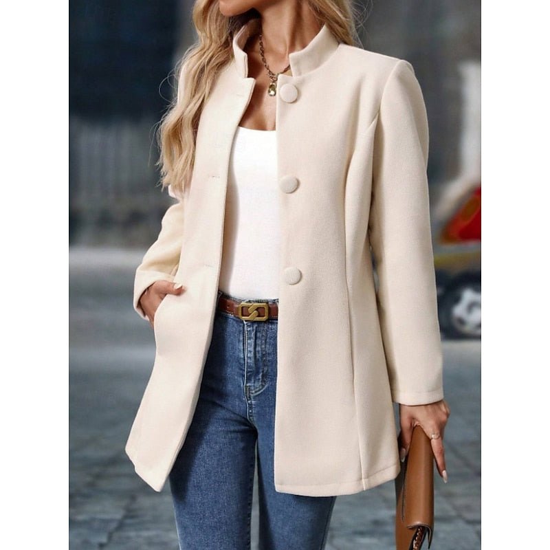 Versatile women's trench coat, featuring a stand collar & tailored fit for elegant fall fashion.