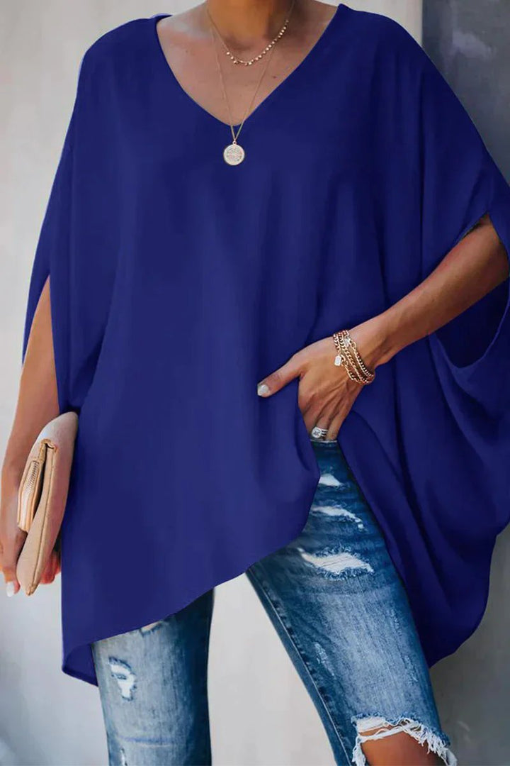 Black women's V-neck batwing-sleeve tunic top, oversized and casual for comfortable, everyday style.