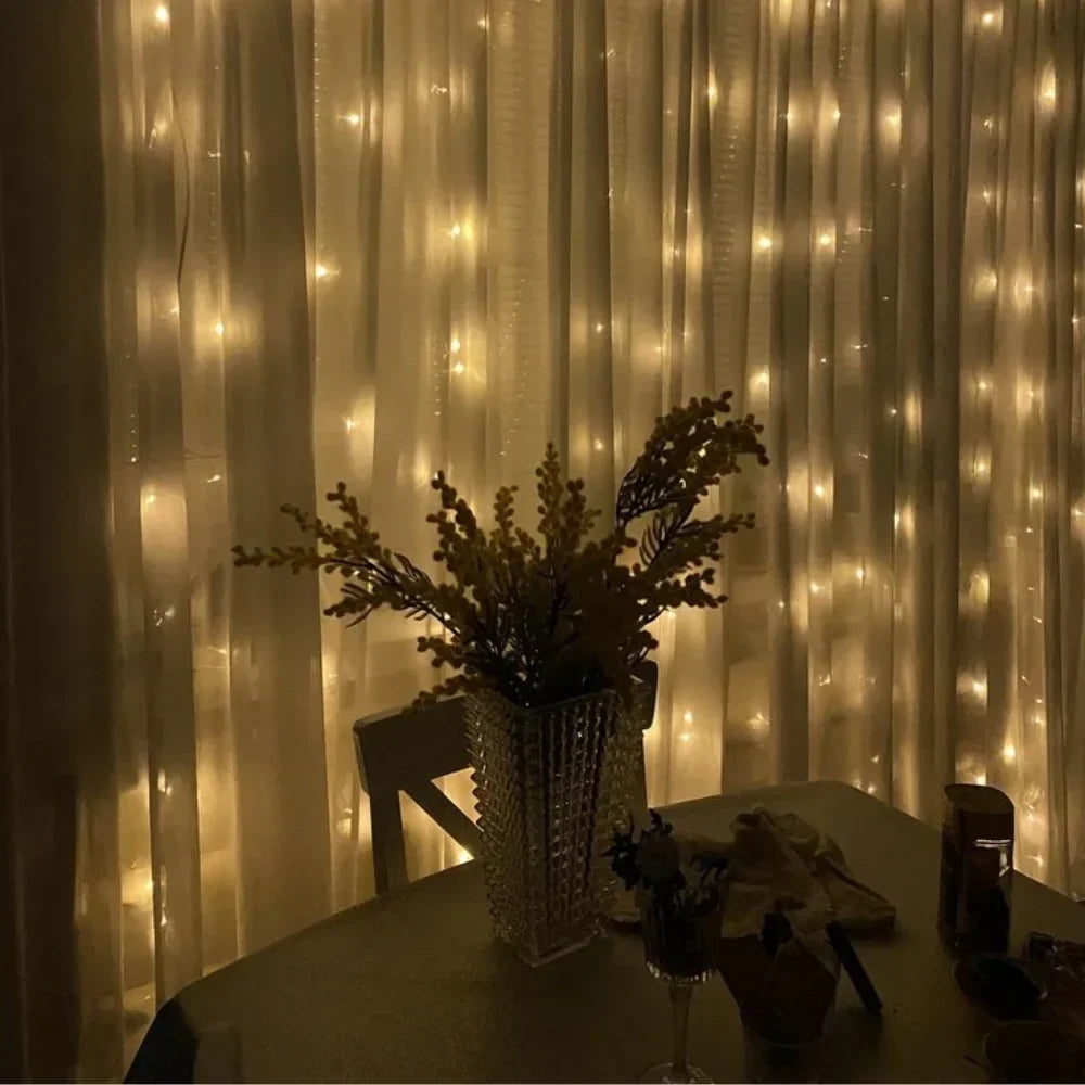 Magical warm white LED fairy lights, a stunning curtain of light for any room or event.