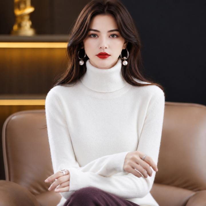 Warm women's cashmere blend sweater, providing cozy comfort with a stylish roll-neck design.