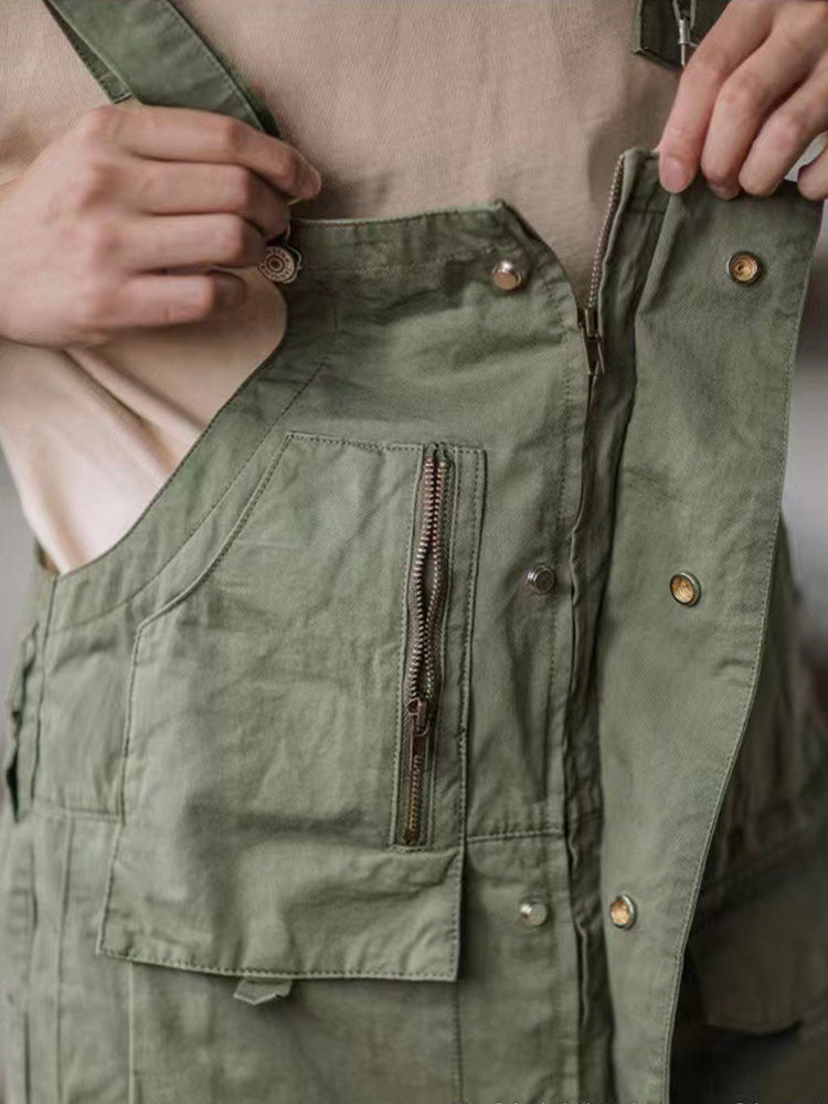 Versatile men's workwear overalls with multiple pockets for tools & essentials.