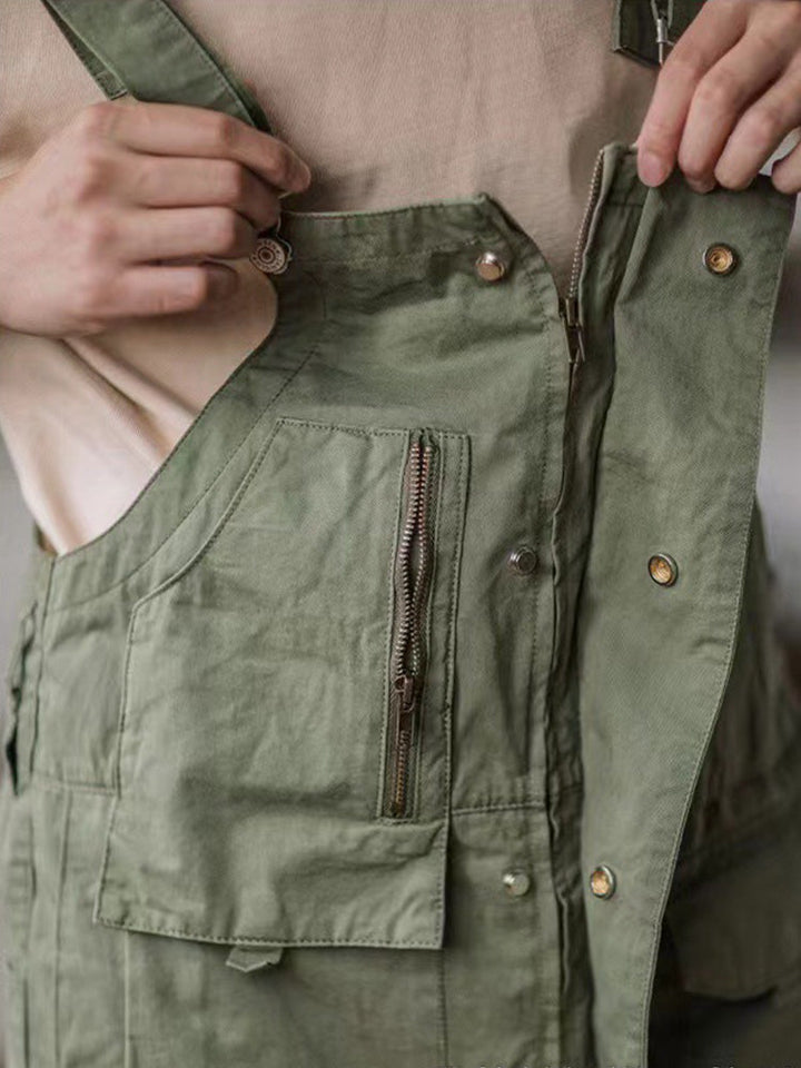 Versatile men's workwear overalls with multiple pockets for tools & essentials.