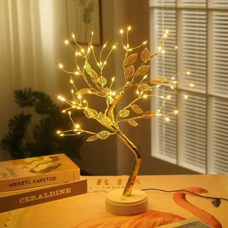 Close-up of a detailed LED golden leaf bonsai tree lamp, showcasing its intricate design and soft warm white glow.