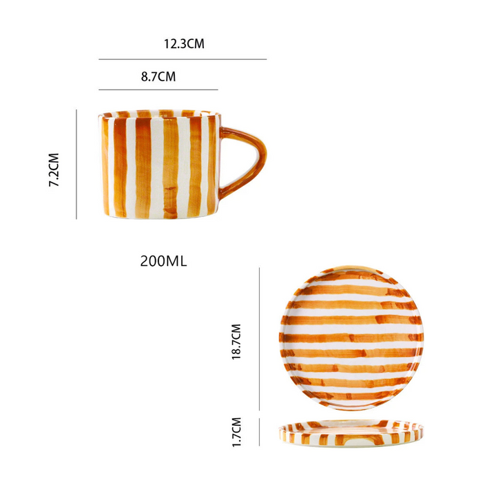 RetroChic ceramic coffee cup and saucer set, hand-painted for a vintage style kitchen decor.