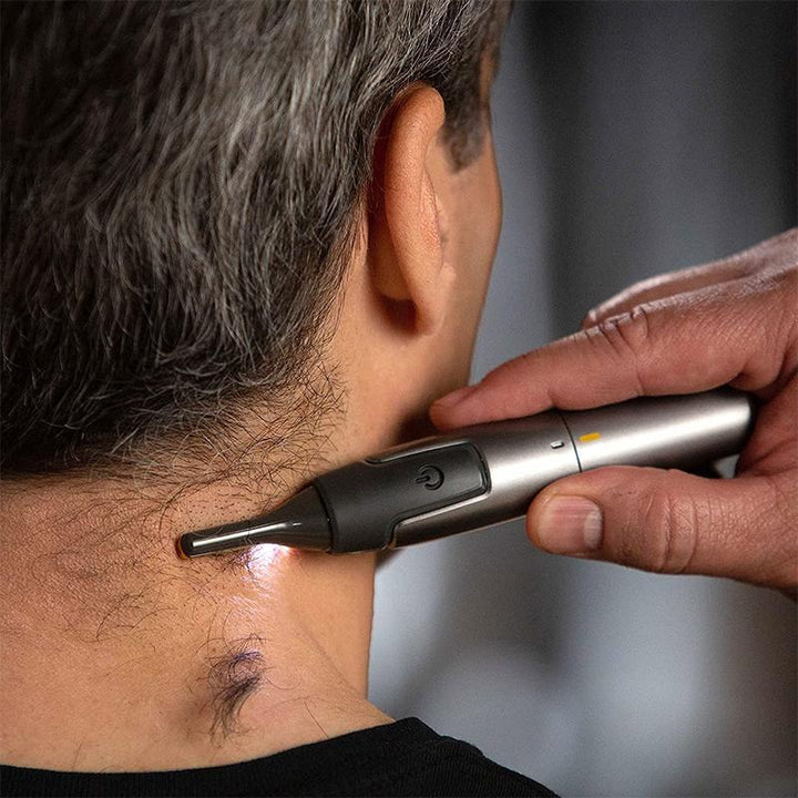 Professional Men's Trimmer with long-lasting Titanium blades and integrated LED for dark areas.