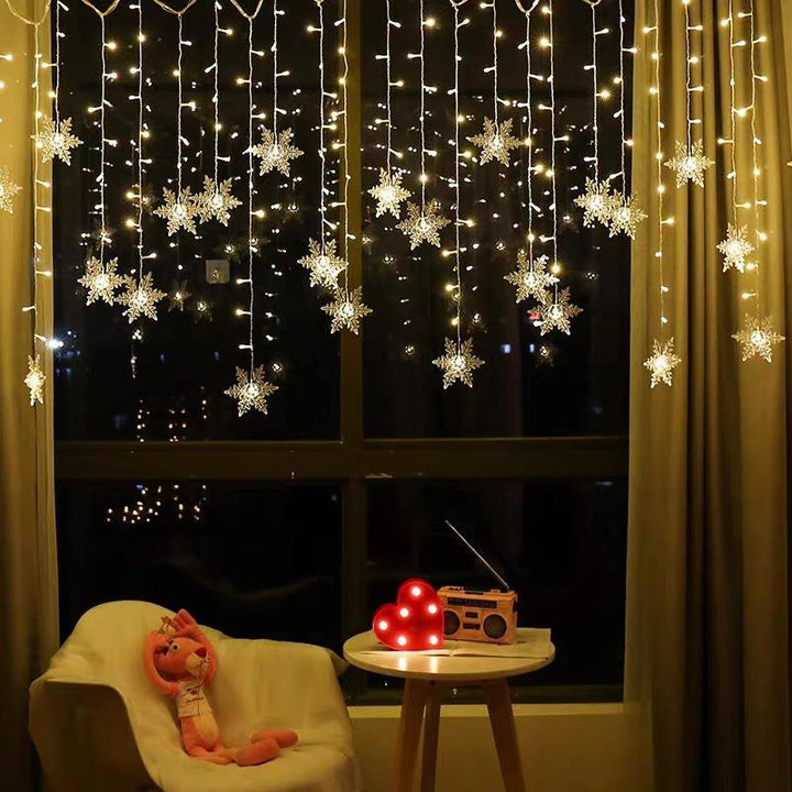 Decorative LED snowflake fairy lights, ideal for winter holiday home & party decor.