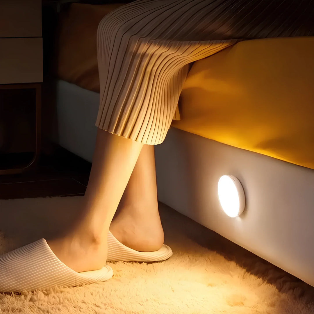 Sleek LED motion sensor night light with magnetic mount for easy, wireless installation in any home space.