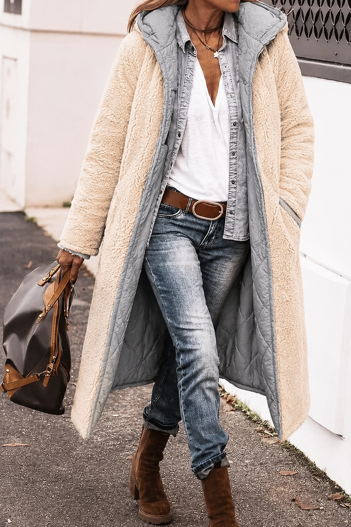 Fashionable women's reversible coat, designed for cold weather and chic winter layering.
