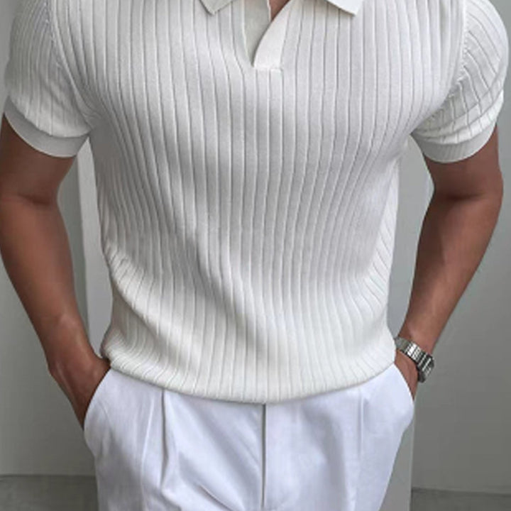 Classic men's polo shirt with refined ribbed texture, ideal for sophisticated everyday wear.