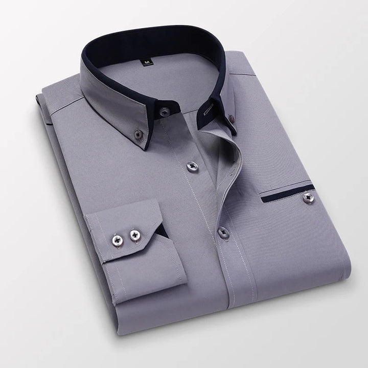 Polished men's versatile long-sleeve shirt. Stylish button-up with subtle contrast details for a smart look.