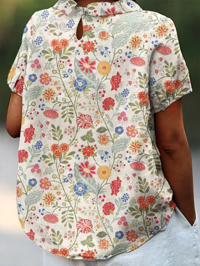 Effortless women's laid-back casual shirt, comfortable relaxed fit, short sleeve for versatile everyday style.