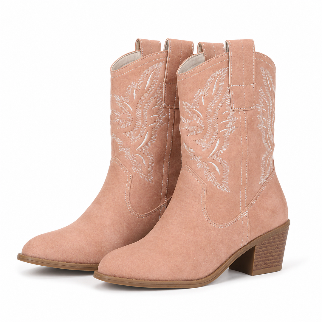 Fashionable slip-on embroidered western ankle boots for women, featuring a block heel and stylish pointed toe for winter.